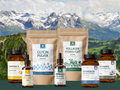 Sortiment an VITALOVE Nahrungsergänzungsmitteln vor Schweizer Bergpanorama Mobileansicht
